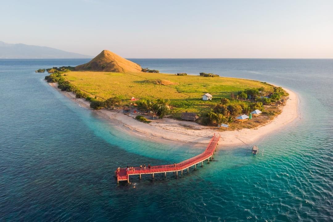 Kenawa Island red pier at sunset