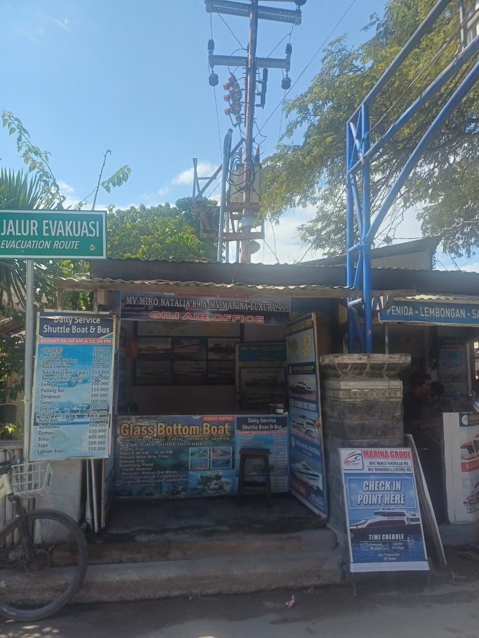 Gili Air check-in counter with schedule board