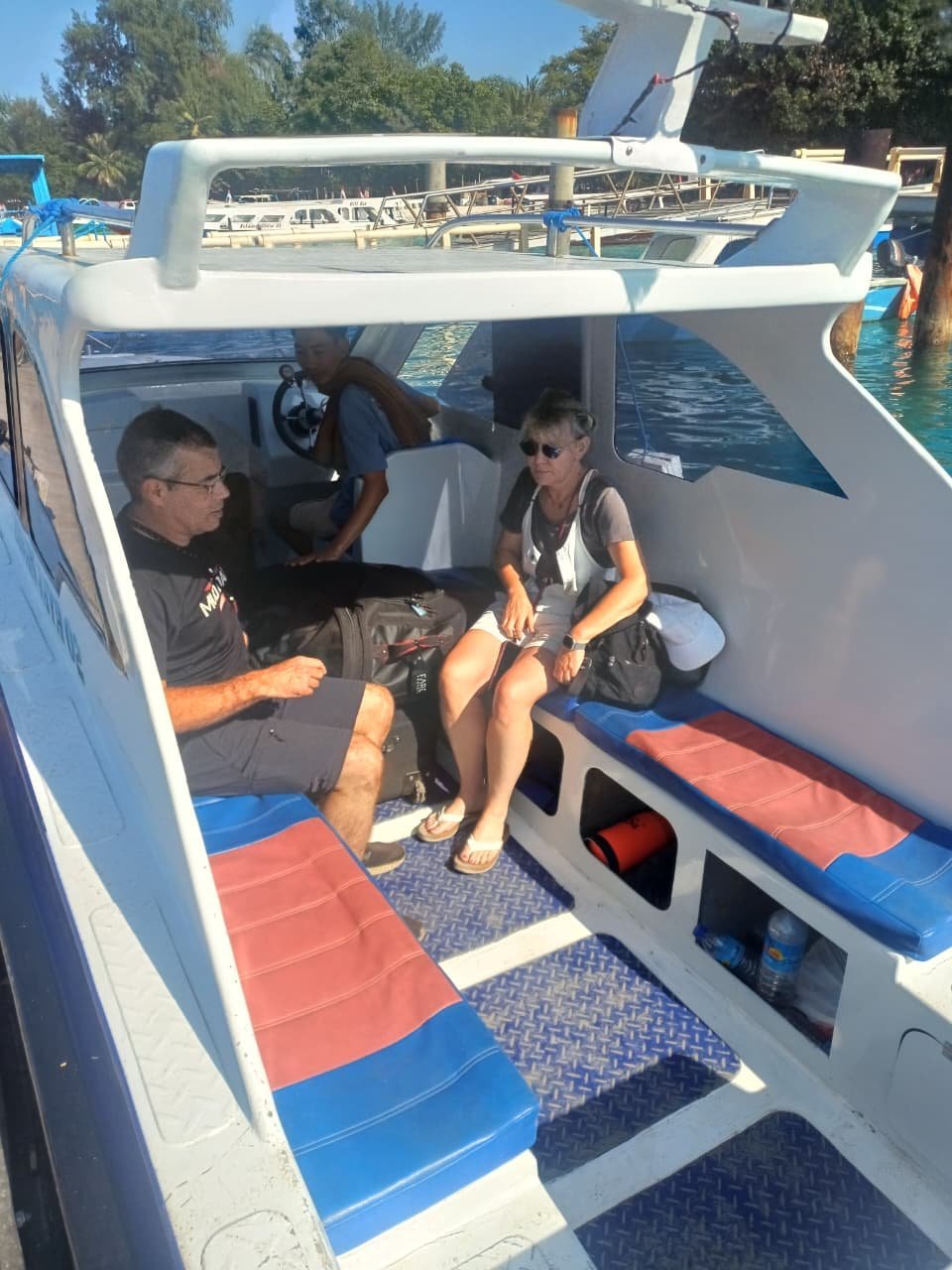 Guests relaxing inside a private speed boat cabin