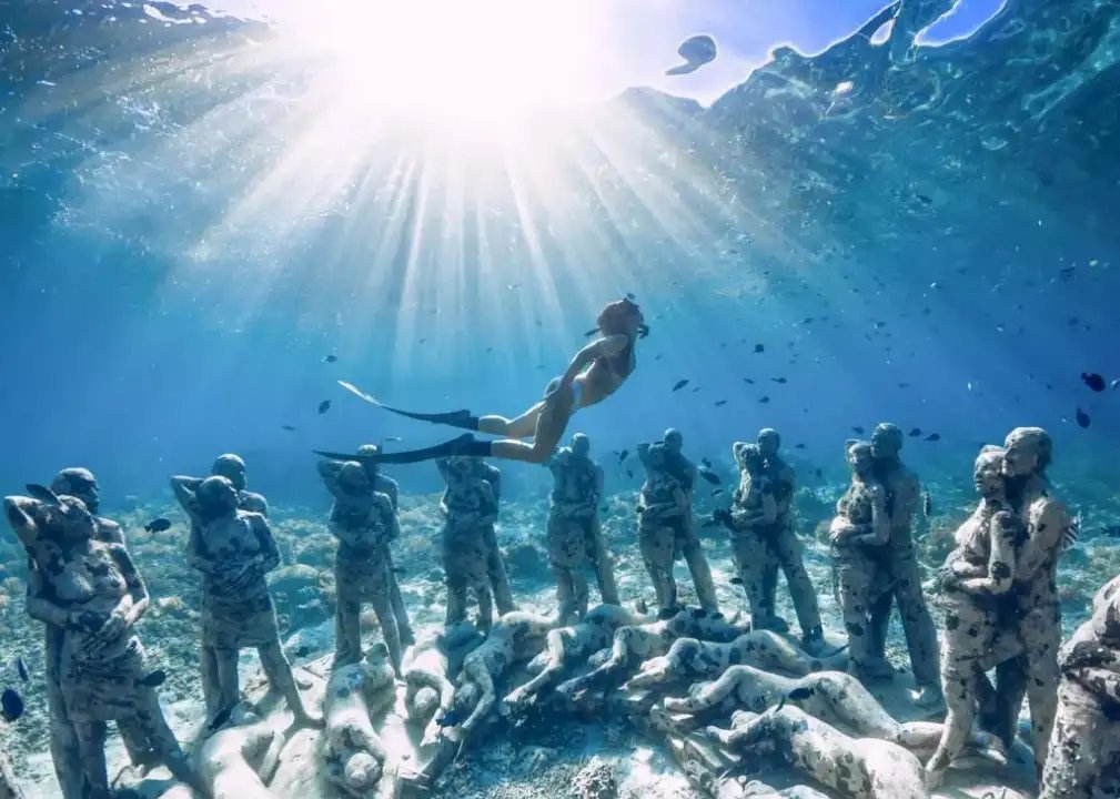 Snorkeling above the underwater sculpture park, Gili Meno